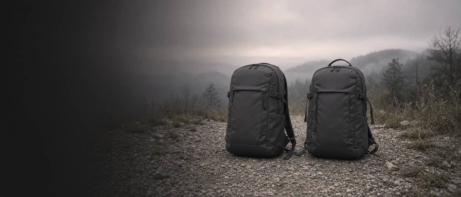 Two similar backpacks on trailhead gravel, centred split composition