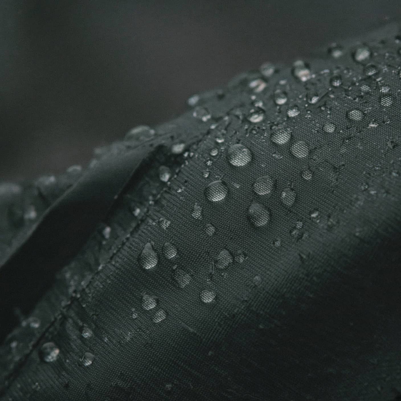 Macro of water beading on jacket fabric