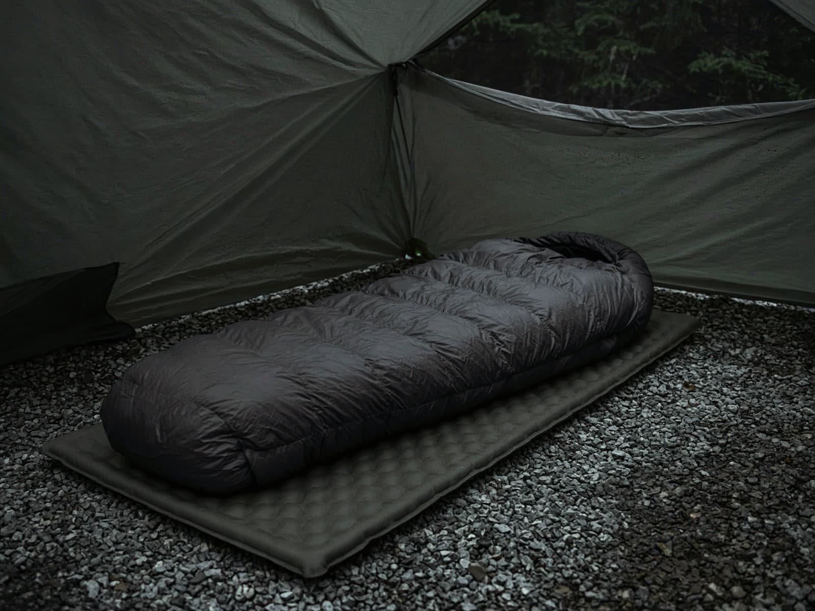 A 15-degree down mummy bag lofted on a pad inside a tent