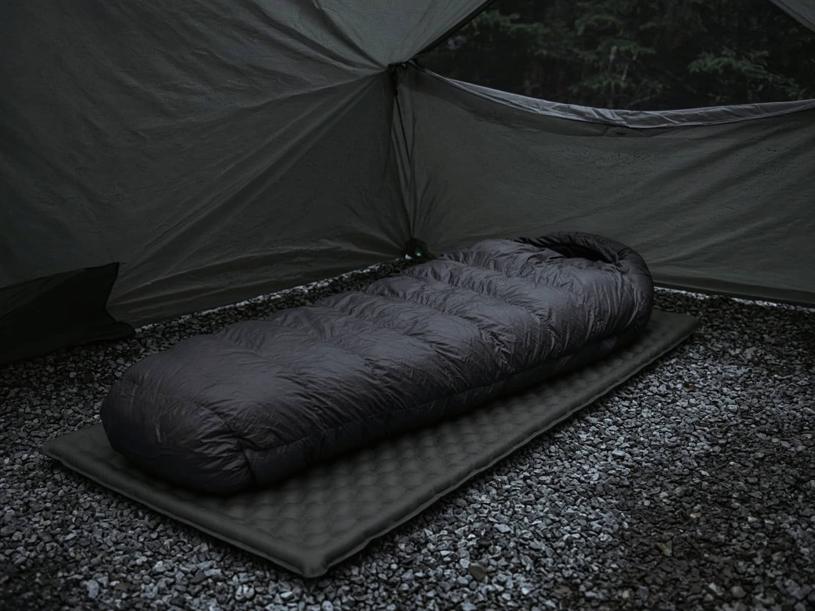 A 15-degree down mummy bag lofted on a pad inside a tent